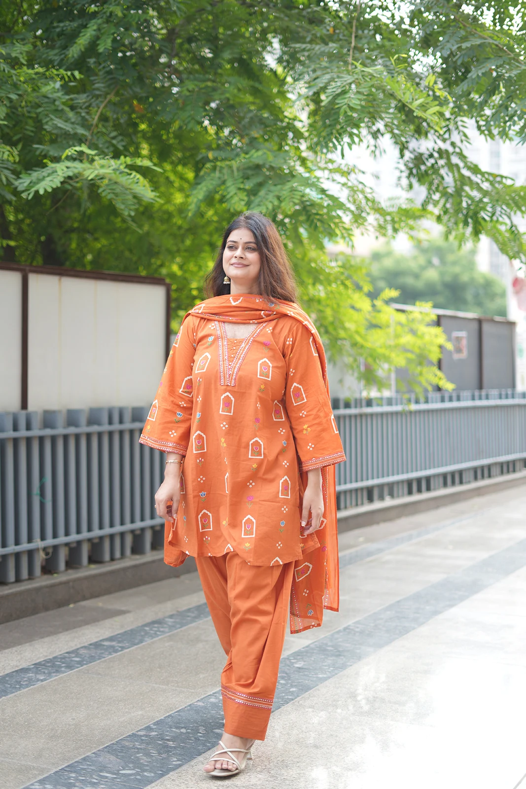 Orange Farsi suit set with detailed bell sleeves