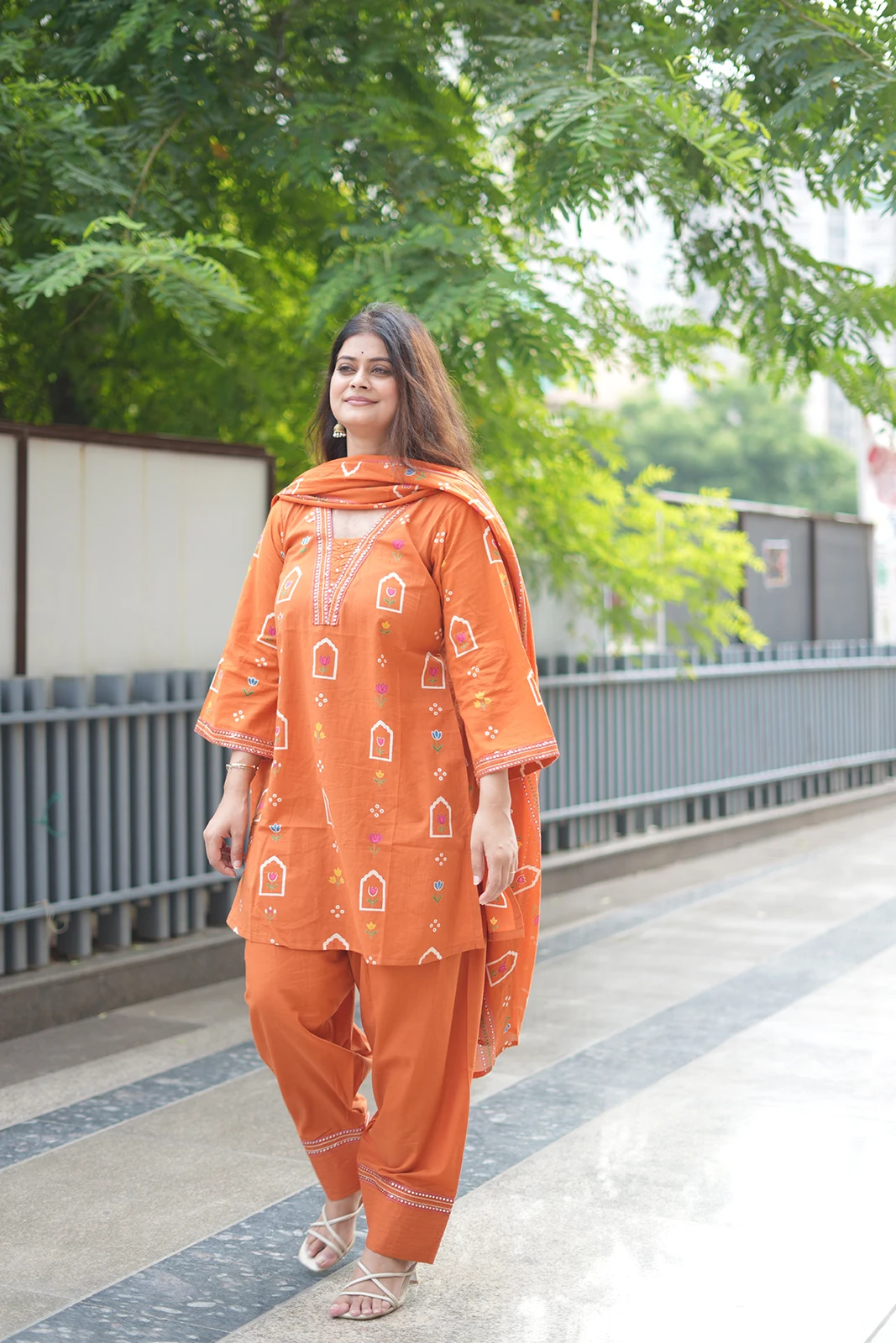 Orange cotton kurta with printed Farsi salwar and dupatta